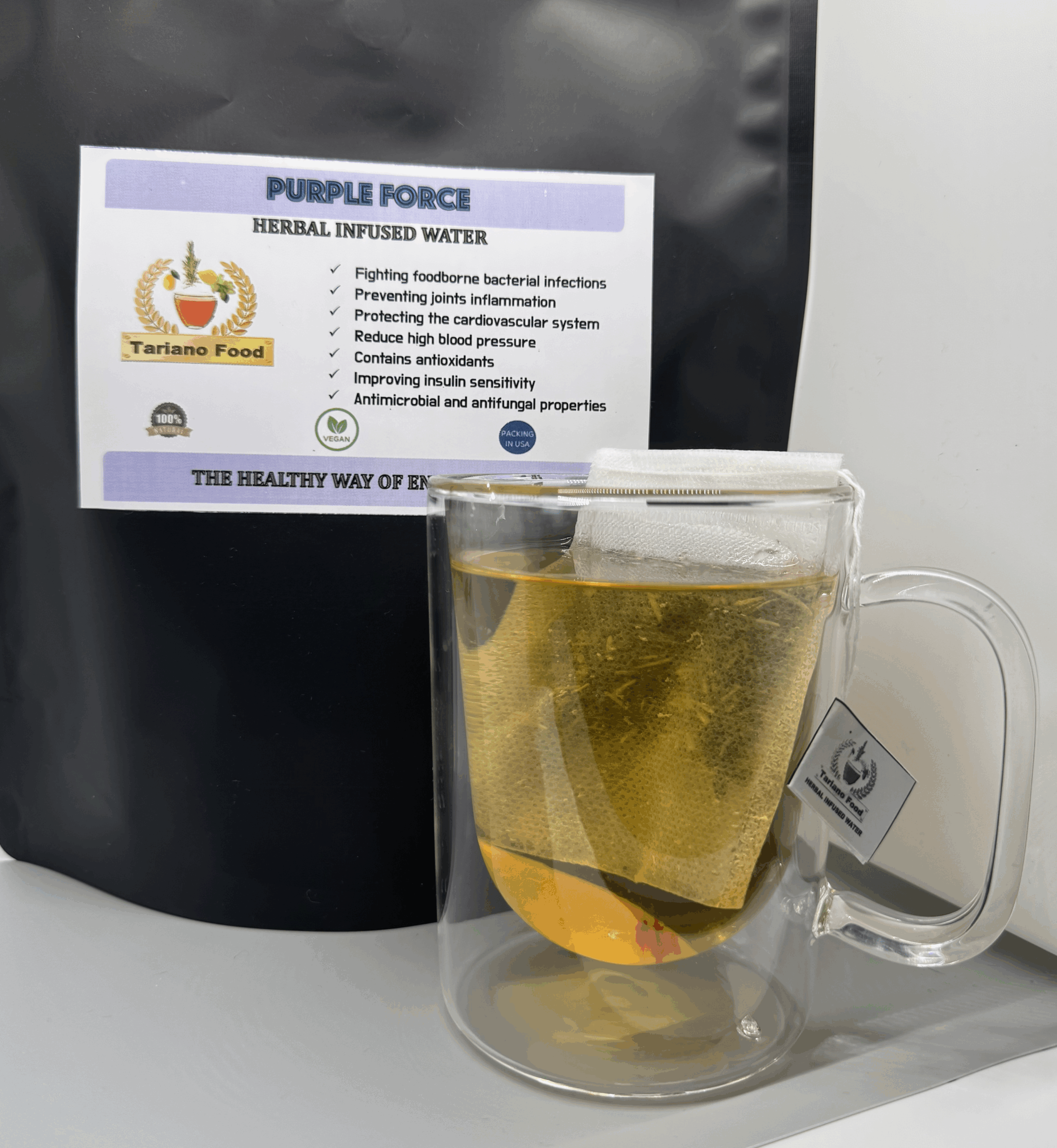 Transparent mug filled with herbal infused water labeled "Purple Force," promoting health benefits like antioxidant properties and improved insulin sensitivity.