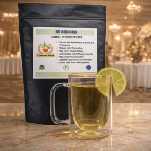 Herbal infused water in a clear mug, garnished with a lemon slice, next to a black packaging highlighting health benefits like antioxidants and immune support.